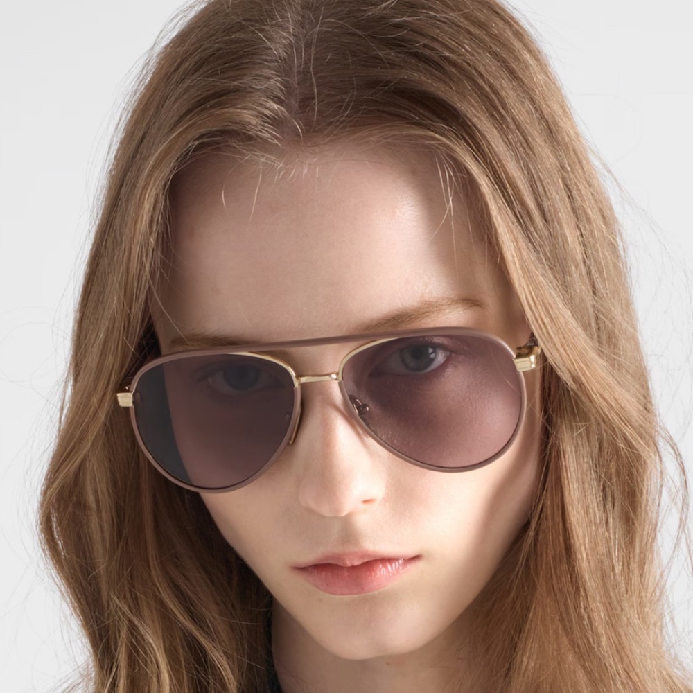 Prada Aviators sunglasses with the iconic metal plaque